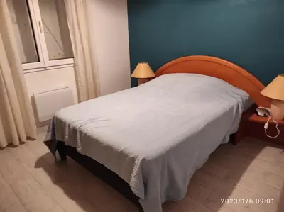 Un ou plusieurs lits dans un hébergement de l'établissement Er Mervent Maison de vacances