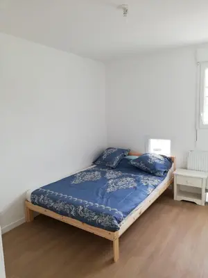 Un ou plusieurs lits dans un hébergement de l'établissement Chambre privée dans Happy Home Maison Calme Chez l'habitant