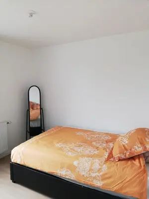 Un ou plusieurs lits dans un hébergement de l'établissement Chambre privée dans Happy Home Maison Calme Chez l'habitant