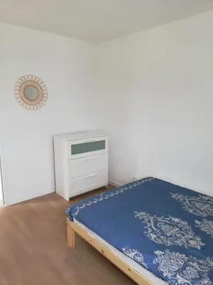 Un ou plusieurs lits dans un hébergement de l'établissement Chambre privée dans Happy Home Maison Calme Chez l'habitant