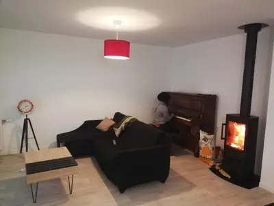 Coin salon dans l'établissement Chambre privée dans Happy Home Maison Calme Chez l'habitant