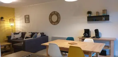 Coin salon dans l'établissement Le Sentier Des Dunes 