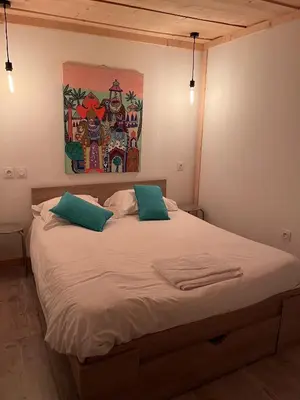 Un ou plusieurs lits dans un hébergement de l'établissement Le Gîte les NUZ ( parc du château de Keroüartz)