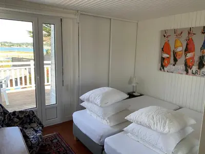 Un ou plusieurs lits dans un hébergement de l'établissement Maison sur la pointe du Cap Coz