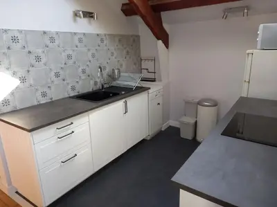 Cuisine ou kitchenette dans l'établissement Au coeur de Sainte-Christine