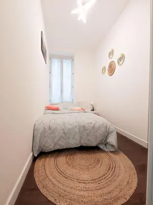 Un ou plusieurs lits dans un hébergement de l'établissement Beau T2 hypercentre à la cathédrale