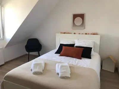 Un ou plusieurs lits dans un hébergement de l'établissement Maison d'exception ~ Vue Mer ~ 100m de la plage