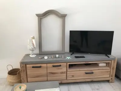 Télévision ou salle de divertissement dans l'établissement Ty Breizh