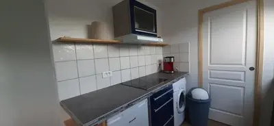 Cuisine ou kitchenette dans l'établissement 16 BIS C Les Gîtes Bigoudens