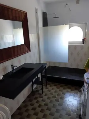 Un ou plusieurs lits dans un hébergement de l'établissement Maison bord de mer
