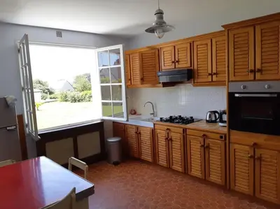 Cuisine ou kitchenette dans l'établissement Maison bord de mer
