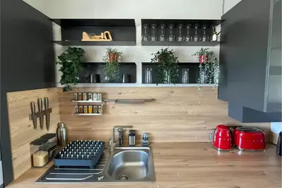Cuisine ou kitchenette dans l'établissement Appartement - Concarneau