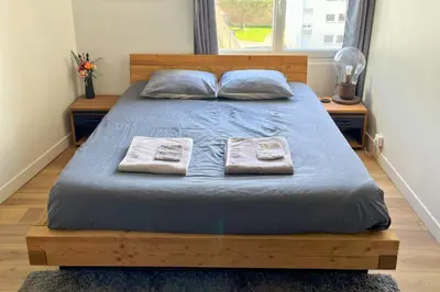 Un ou plusieurs lits dans un hébergement de l'établissement Appartement - Concarneau