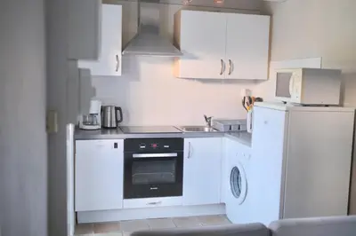 Cuisine ou kitchenette dans l'établissement Les Gîtes du Vallon du Trunvel