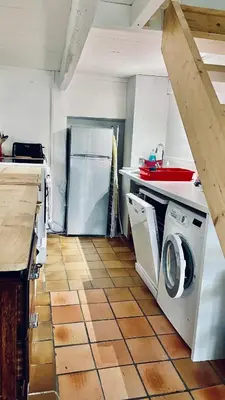 Cuisine ou kitchenette dans l'établissement Le penty de Lesquiffinec