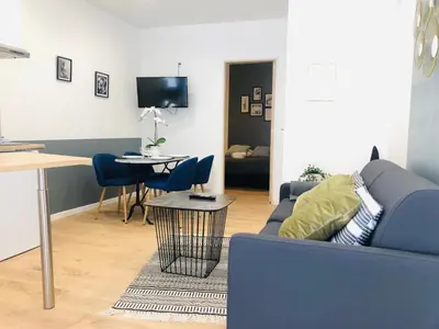 Télévision ou salle de divertissement dans l'établissement Atelier Arthaud