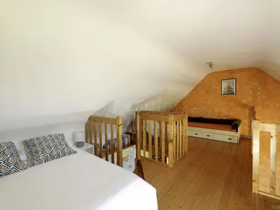 Un ou plusieurs lits dans un hébergement de l'établissement Holiday home in Sibiril near sandy beaches