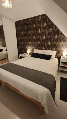 Un ou plusieurs lits dans un hébergement de l'établissement Chambres chez Emmanuelle entre 2 Abers
