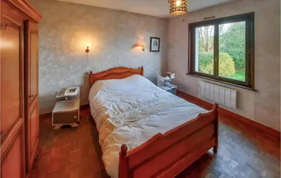 Un ou plusieurs lits dans un hébergement de l'établissement 4 Bedroom Nice Home In Plougasnou