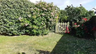 Jardin de l'établissement Gite de Kervao, Hortensias meublé 3 étoiles, Plage 700 m