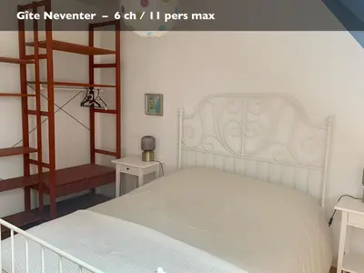 Un ou plusieurs lits dans un hébergement de l'établissement Les Gîtes du Manoir de Keryvon