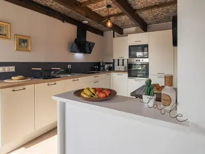 Cuisine ou kitchenette dans l'établissement Holiday Home Ty Lez by Interhome