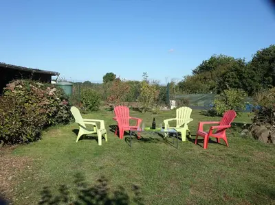 Jardin de l'établissement Charmante longère près des côtes Finistériennes