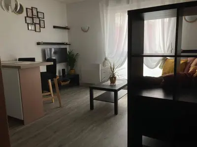 Télévision ou salle de divertissement dans l'établissement Cozy'Nest
