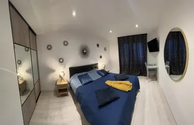 Un ou plusieurs lits dans un hébergement de l'établissement Appartement brest st-marc 6-8personne 2min centre