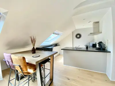 Cuisine ou kitchenette dans l'établissement LE NID DES QUAIS - Vue Panoramique au cœur de la ville - Wifi - Entrée autonome