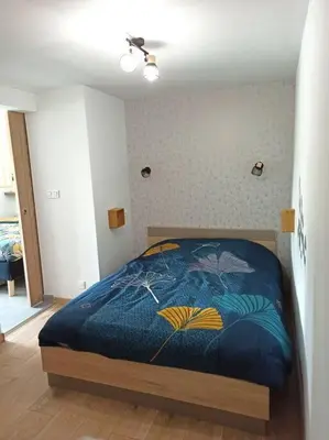 Un ou plusieurs lits dans un hébergement de l'établissement Superbe appartement Trébeurden proche mer, parking