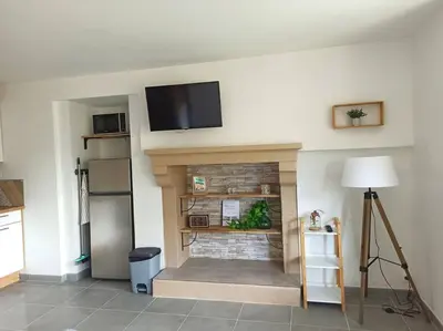 Télévision ou salle de divertissement dans l'établissement Superbe appartement Trébeurden proche mer, parking