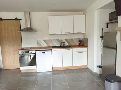 Cuisine ou kitchenette dans l'établissement Superbe appartement Trébeurden proche mer, parking