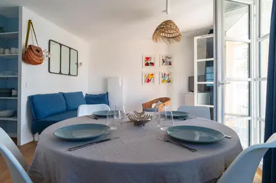 Coin salon dans l'établissement Côté Ouest - Appt avec piscine partagée