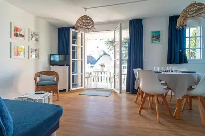 Coin salon dans l'établissement Côté Ouest - Appt avec piscine partagée