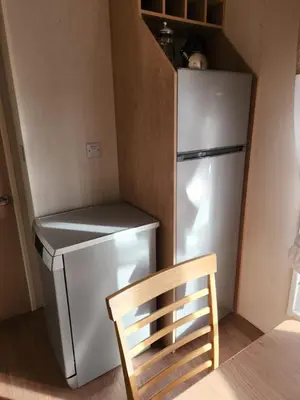Cuisine ou kitchenette dans l'établissement Mobilhome - Kedidrouz du Léon - Kerlann - Pont Aven