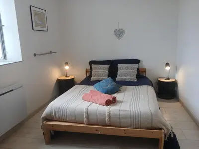 Un ou plusieurs lits dans un hébergement de l'établissement Manoir de kerozet - Chambres chez l'habitant - 3 chiens