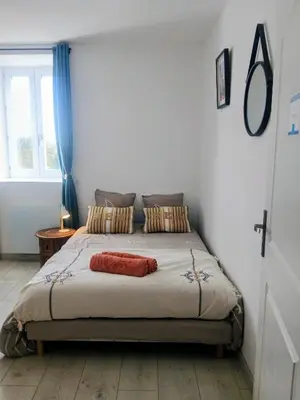 Un ou plusieurs lits dans un hébergement de l'établissement Manoir de kerozet - Chambres chez l'habitant - 3 chiens