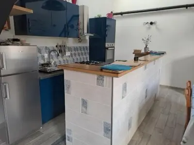 Cuisine ou kitchenette dans l'établissement Ty-garde