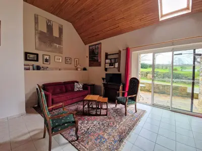 Coin salon dans l'établissement Apartment in Brittany near Sandy Beaches