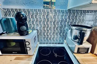 Cuisine ou kitchenette dans l'établissement La p'tite sardine