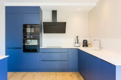 Cuisine ou kitchenette dans l'établissement Escale à Saint-Gué