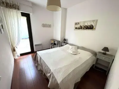 Un ou plusieurs lits dans un hébergement de l'établissement Terrasse au calme, cœur de Bénodet, appartement à 400m de la plage avec parking privatif - FR-1-481-133