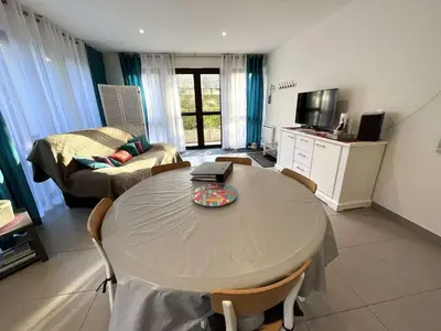Cuisine ou kitchenette dans l'établissement Terrasse au calme, cœur de Bénodet, appartement à 400m de la plage avec parking privatif - FR-1-481-133
