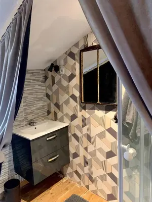 Salle de bains dans l'établissement La Passerelle