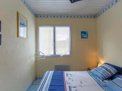 Un ou plusieurs lits dans un hébergement de l'établissement Holiday Home La Glycine by Interhome