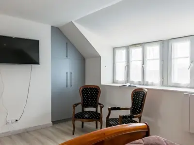 Télévision ou salle de divertissement dans l'établissement Holiday Home Ty Frouden by Interhome