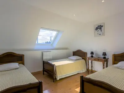 Un ou plusieurs lits dans un hébergement de l'établissement Holiday Home Ty Frouden by Interhome