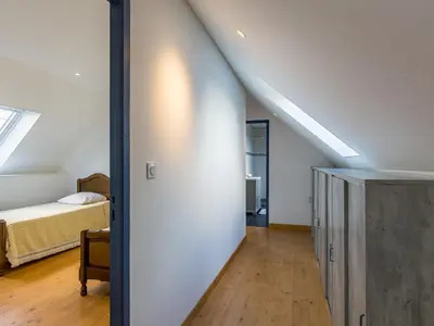 Un ou plusieurs lits dans un hébergement de l'établissement Holiday Home Ty Frouden by Interhome