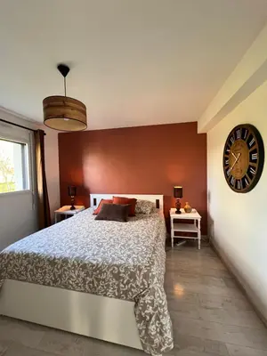 Un ou plusieurs lits dans un hébergement de l'établissement Maison moderne sur le port